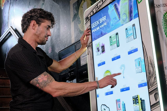 Customer purchasing a mystery vape from a VapeTM vending machine