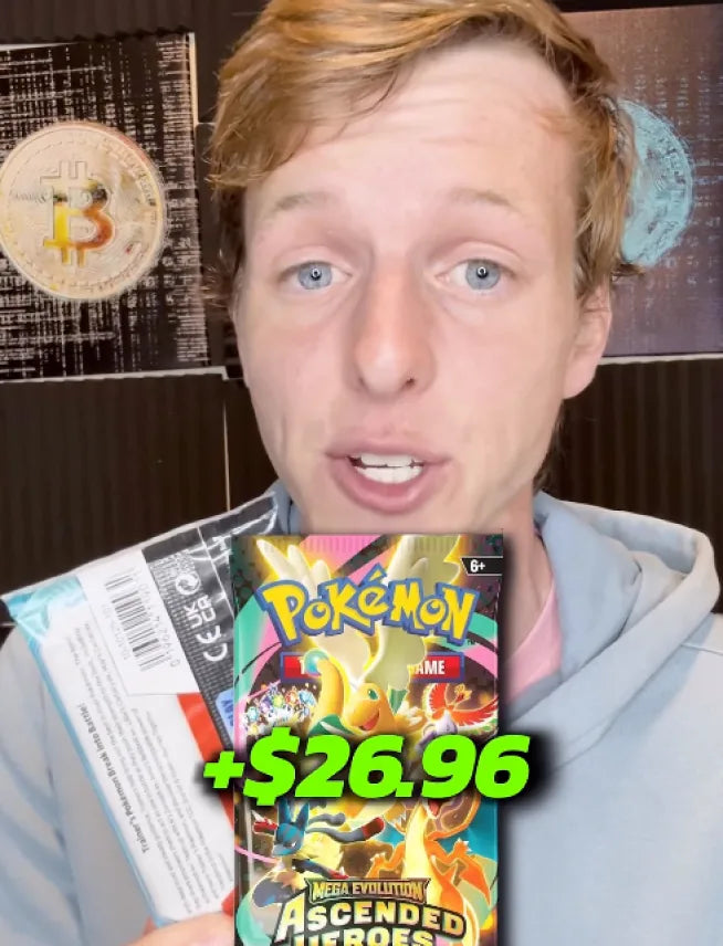 Video thumbnail of a man holding a Pokemon Ascended Heroes booster pack with a plus $26.96 value overlay