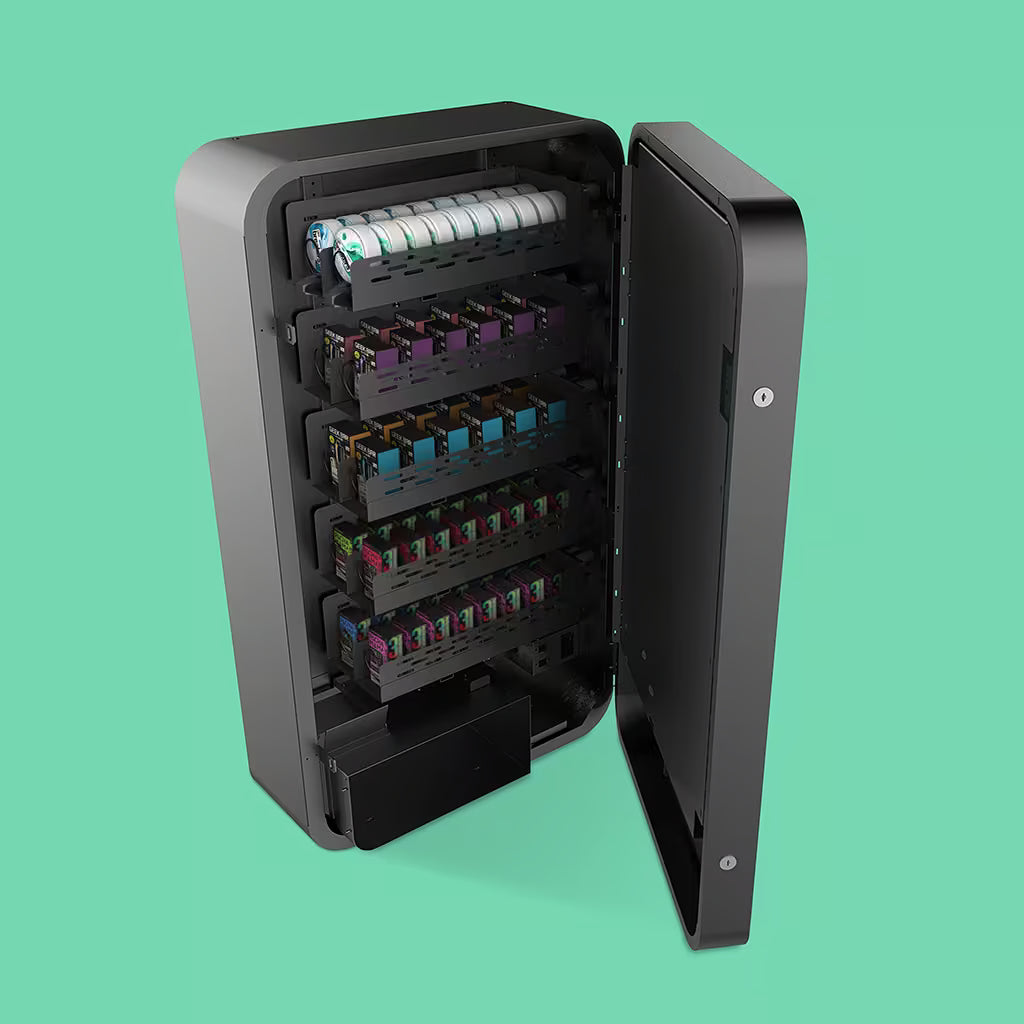 Slim wall vape vending machine loaded with Lucy Breakers pouches, Pachamama, and Geek Bar.