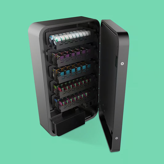 Slim wall vape vending machine loaded with Lucy Breakers pouches, Pachamama, and Geek Bar.