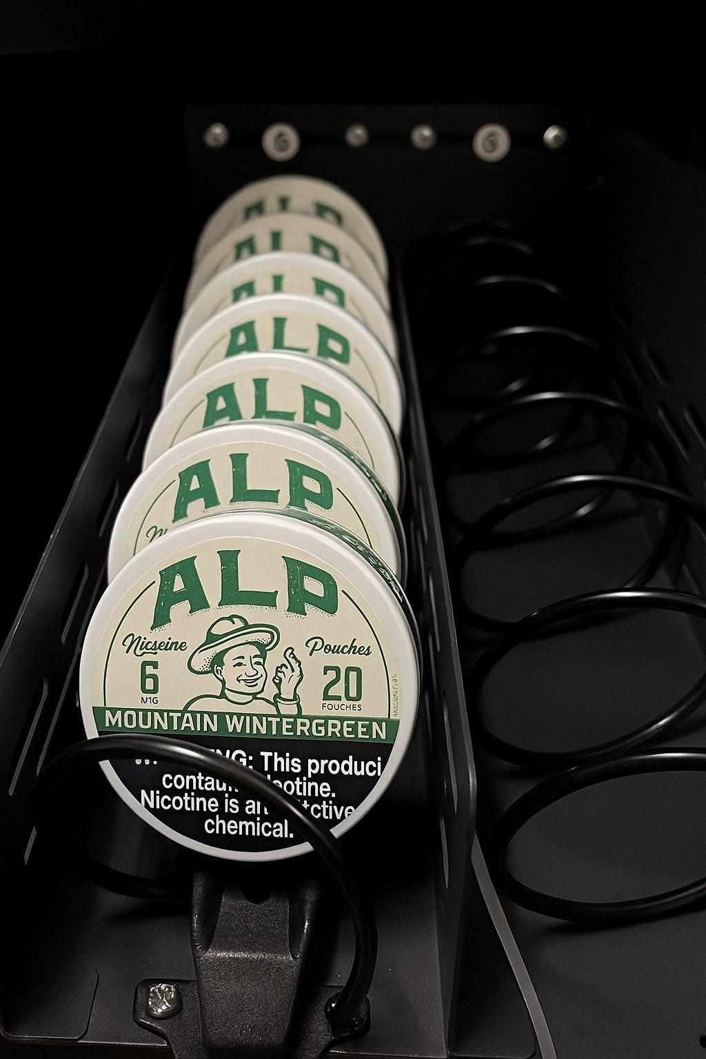 Nicotine pouch tin lifter adapter for ZYN, ALP, and other tins in coil vending machines